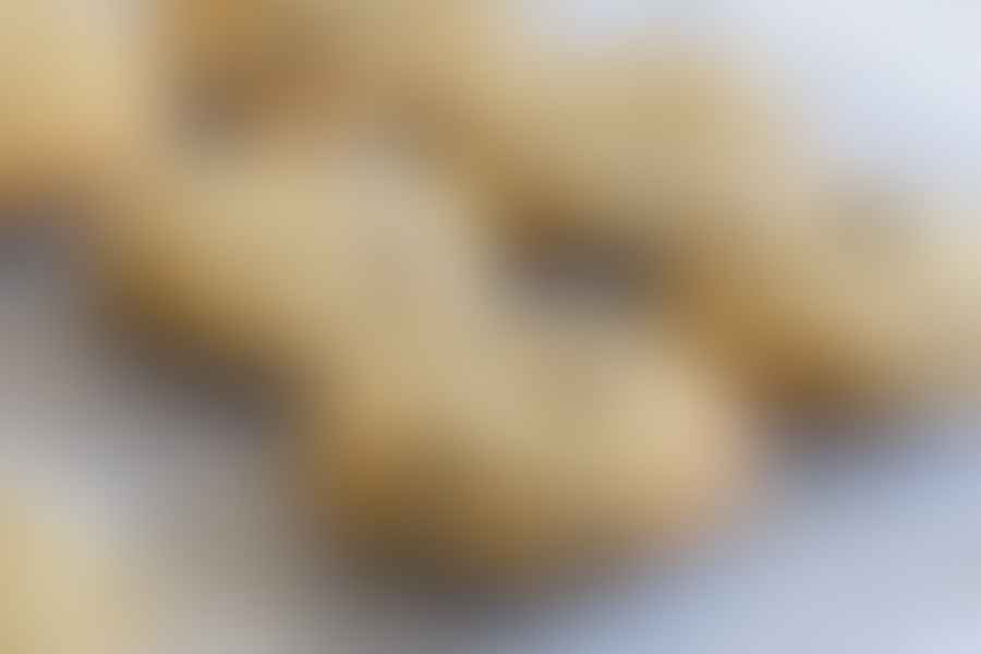 Freshly baked sourdough cookies on a cooling rack